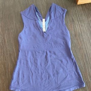 Lululemon workout shirt in size 6 with built-in bra.